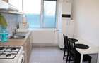Apartament cu 3 camere semidecomandat în Central - 3