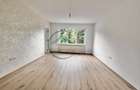 Apartament cu 4 camere decomandat în Tractorul - 1