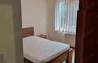 Apartament cu 4 camere decomandat în Tractorul - 4