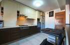Apartament cu 4 camere decomandat în Tractorul - 5