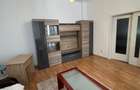 Apartament elegant cu 2 camere, loc de parcare ?i curte comuna Mara?ti
