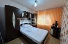 Apartament decomandat 3 camere 2 bai 68 mpu etaj 3 Calimanesti Valcea - 9