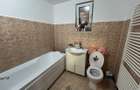 Vand casa din caramida, st.494 mp, sc.131 mp, cu 4 cam.2 bai, moderna