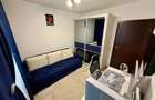 Vand apartament cu 3 camere complet mobilat si utilat.