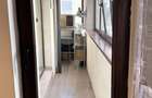 Apartament de inchiriat 3 camere, doua bai, bucatarie inchisa, 70 mp, utilat complet strada Tineretului 37i - 8
