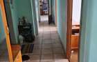 Apartament cu 4 camere semidecomandat în Runcu - 1