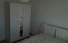 Apartament cu 3 camere decomandat în Titan - 11