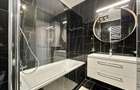 Apartament cu 4 camere decomandat în Central - 24