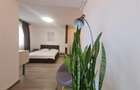 Apartament cu 2 camere decomandat în Tractorul - 11