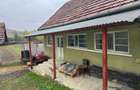 Casă cu Teren 1600 Mp în Luncșoara