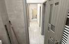 Se inchiriaza apartament cu 2 camere, decomandat, avand o suprafata utila de 52 mp, situat la etajul 3 din 4, in cartierul Rogerius. - 7