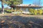 Casa cu teren intravilan si extravilan 9000 mp