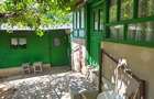 Casă cu 4 camere cu Teren 909 Mp în București - 1