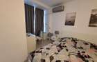 Apartament cu 2 camere decomandat în P-ța Romană - 9