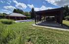 Proprietate exclusivista cu 7.000 mp teren, piscina si multiple spatii