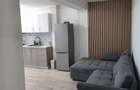 Apartament modern cu 2 camere si loc de parcare de inchiriat