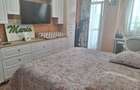 Apartament cu 4 camere decomandat în Tractorul - 11