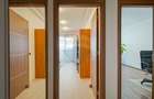 Apartament cu 4 camere decomandat în Tractorul - 21