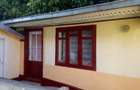 Casă cu 4 camere cu Teren 2000 Mp în Fălciu - 2