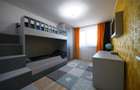 Apartament cu 4 camere decomandat în Tractorul - 2