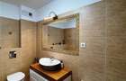 Apartament cu 4 camere decomandat în Tractorul - 42