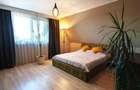 Apartament cu 4 camere decomandat în Tractorul - 4