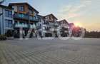 Apartamente cu curte - perfect: camin in inima naturii sau investitie