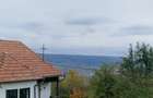 Casa tradi?ionala cu livada ?i vedere panoramica Atia, langa Sovata | 2.054 mp teren intravilan