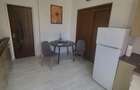 APARTAMENT 2 CAMERE DE VANZARE IN OTOPENI ZONA CENTRALA - 13