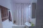 Apartament cu 3 camere decomandat în Dacia - 13