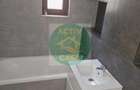 Apartament cu 2 camere decomandat în Roman - 4
