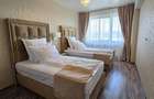 Apartament cu 4 camere decomandat în Tractorul - 7