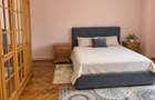 Apartament cu 3 camere, 80mp, etaj intermediar, finisat, mobilat si utilat, cu 2 bai si 2 balcoane,