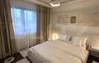 Apartament de lux,2 camere,2 băi,bloc nou,parter +parcare privată