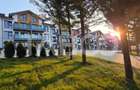 Apartamente cu curte - perfect: camin in inima naturii sau investitie