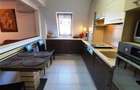 Apartament cu 4 camere decomandat în Tractorul - 39