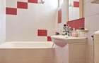 Apartament cu 3 camere decomandat în Calea București - 9