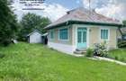 Casă cu 4 camere cu Teren 7481 Mp în Bodești - 1