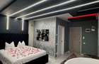 Titan bloc nou , garsoniera lux cu parcsre - 2