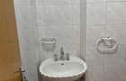 Apartament cu 4 camere decomandat în Titan - 10