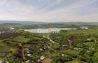 Teren compact intravilan 8000 mp vedere spre Lac, utilita? - 1
