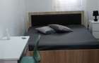 Apartament 2 camere, bucatarie open space, camera, dressing, baie. Modern si utilat