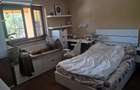 Vand casa Mandruloc constructie 2009 cu 450 mp utili pe 3.000 mp teren cu gazon si livada - 20