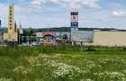 Teren intravilan 10.744 mp, Fagaras, zona comerciala ,2 fronturi, utilitati, par - 4