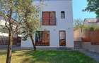 Cladire moderna, superfinisata 500 mp, compus din 4 apartamente, teren - 10