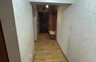 apartament cu 2 camere(transformat in 3 camere), situat pe strada Gheorghe Petra?cu, in bloc P4 - 8