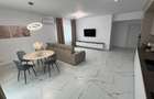 Inchiriez apartament cu 2 camere et 1 complet utilat si nou + parcare
