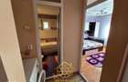 Apartament cu 3 camere in zona centrala - Filiasi - 11