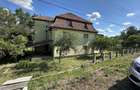 Casa de vanzare cu 64 arii teren