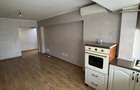 apartament cu 2 camere(transformat in 3 camere), situat pe strada Gheorghe Petra?cu, in bloc P4 - 2